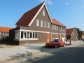 Ondermeer in de Julianastraat in de gemeente Strijen zijn nu de woningen behorende bij fase 1b opgeleverd.