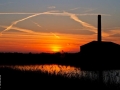 Een mooie foto van de zonsondergang bij Verzorgingstehuis de Hoge Weide door Marc van der Stelt.