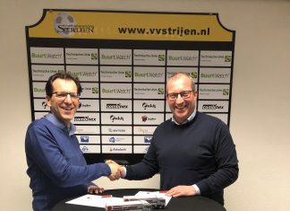 v.v. Strijen en Combinex gaan partnership aan Arie Troost en Dick de Heus schudden elkaar de hand na het zetten van de handtekeningen.